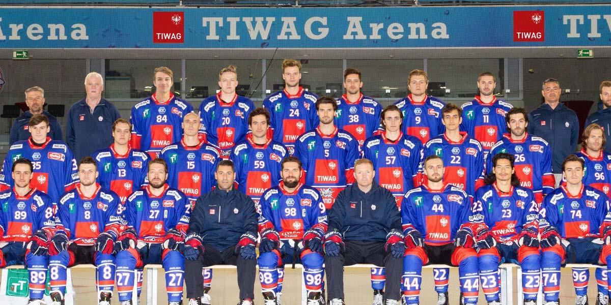 Gruppenfoto von Personen mit TIWAG-Trikots